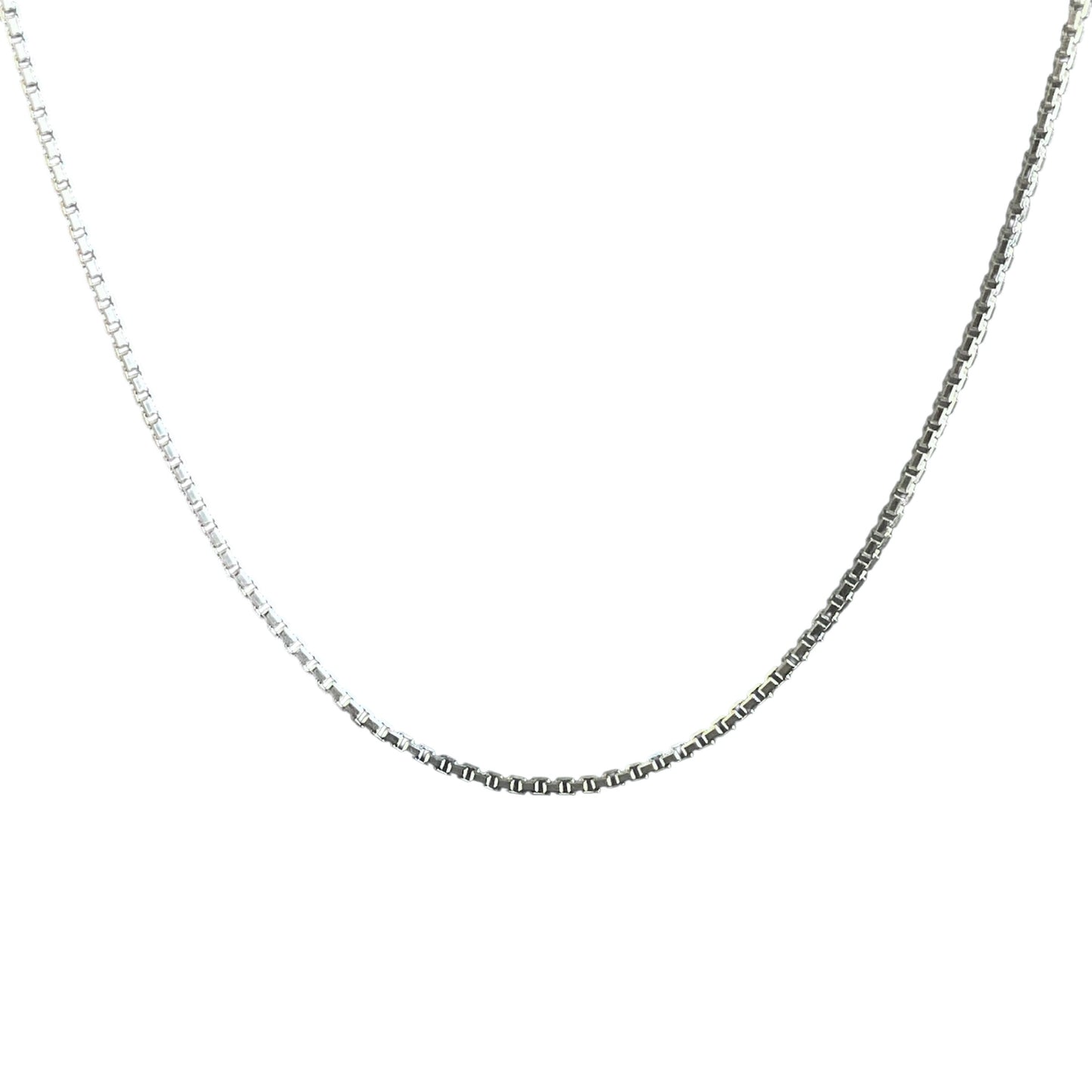 Silver chain necklace on a white background