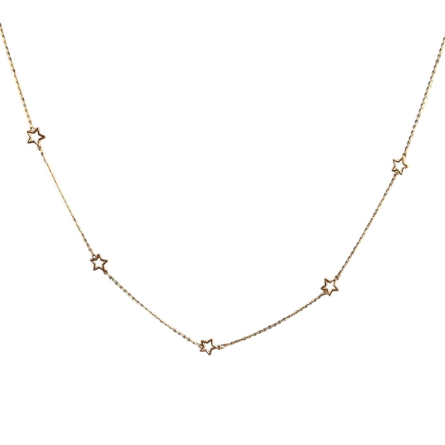 Gold necklace with star-shaped pendants on a white background