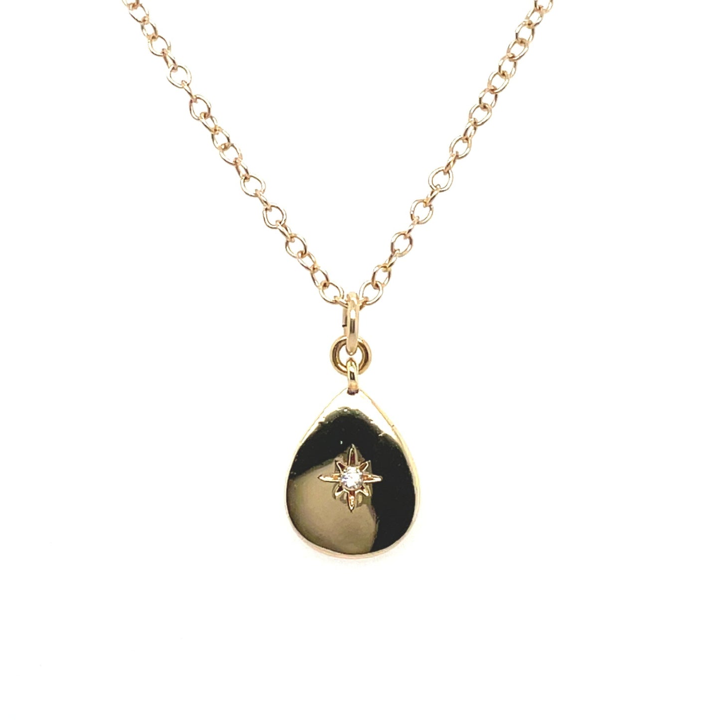 A classic teardrop pendant with a cubic zircona stone on a 14k gold-filled chain.