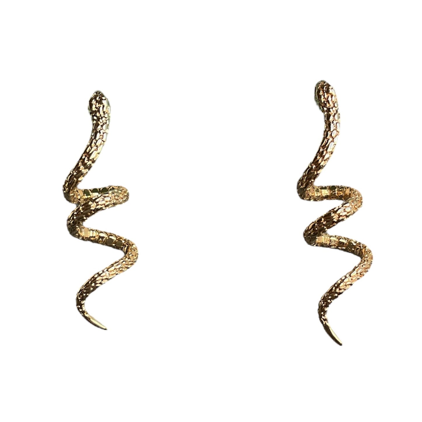 Gold snake-shaped earrings on a white background