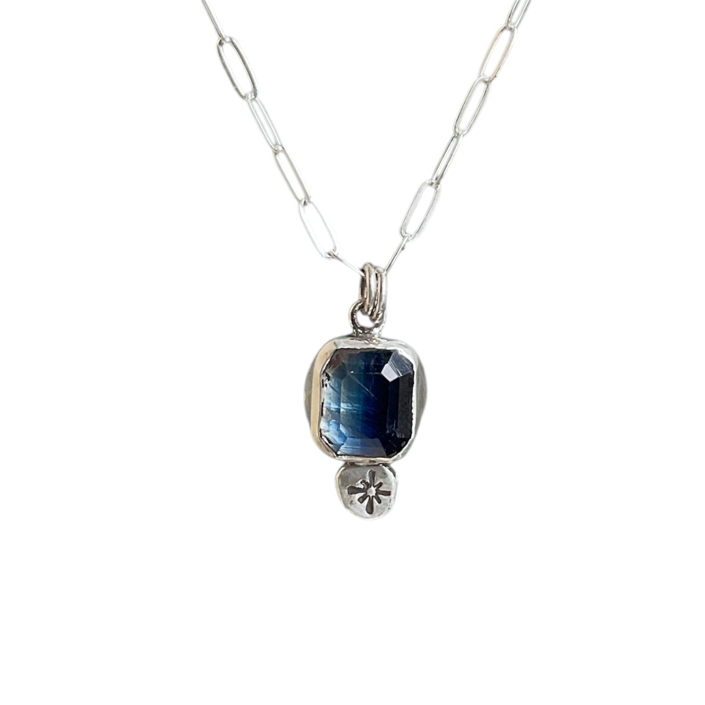 Flashy square blue kyanite gemstone with a star drop embellishment underneath. Solid sterling silver setting and chain