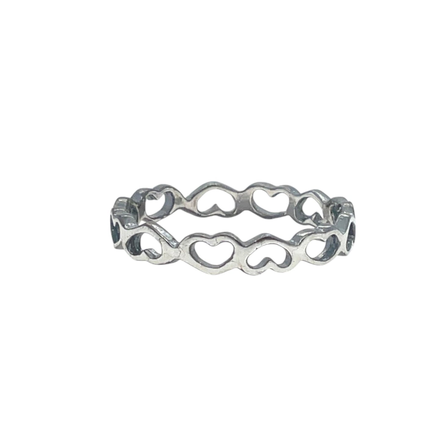 Shiny sterling silver dancing eternity heart ring band with oxidized recesses for high-contrast.