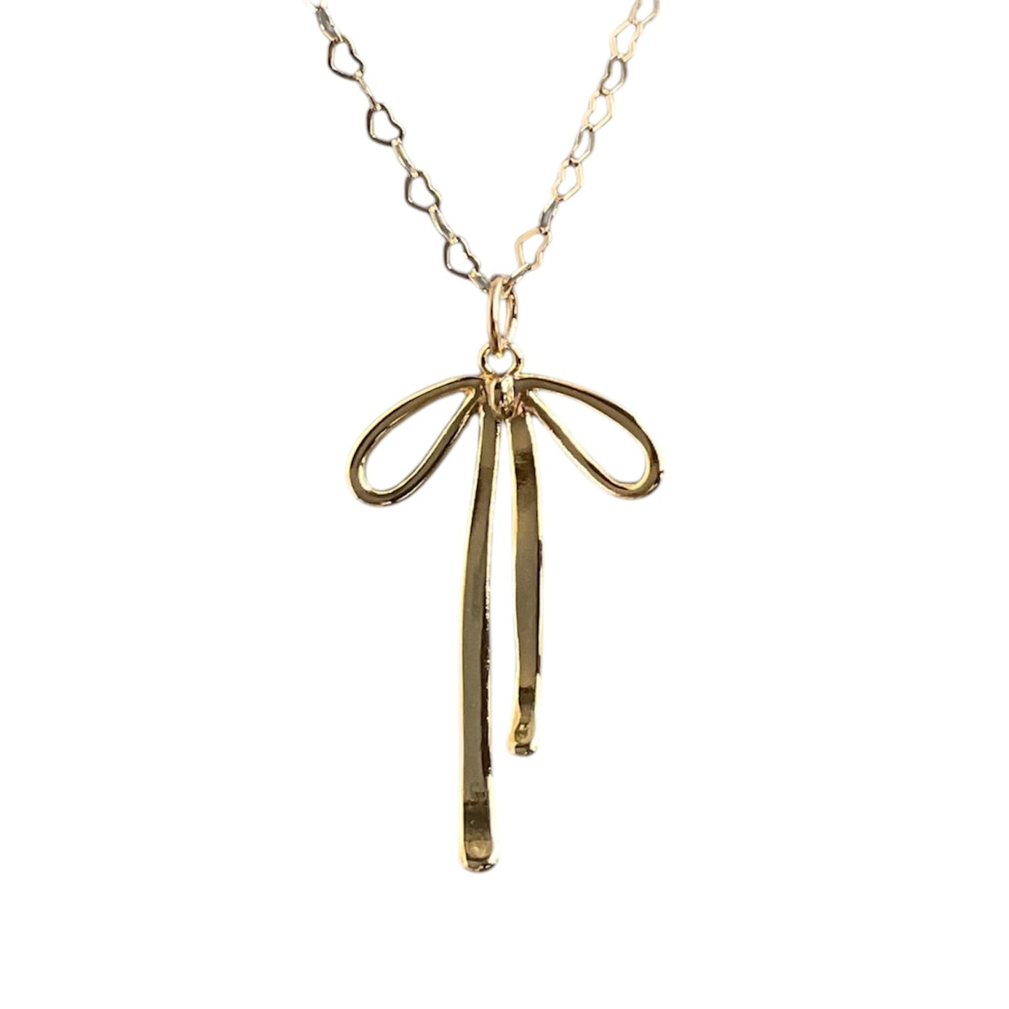 A shiny gold bow pendant on a 14k gold-filled chain.