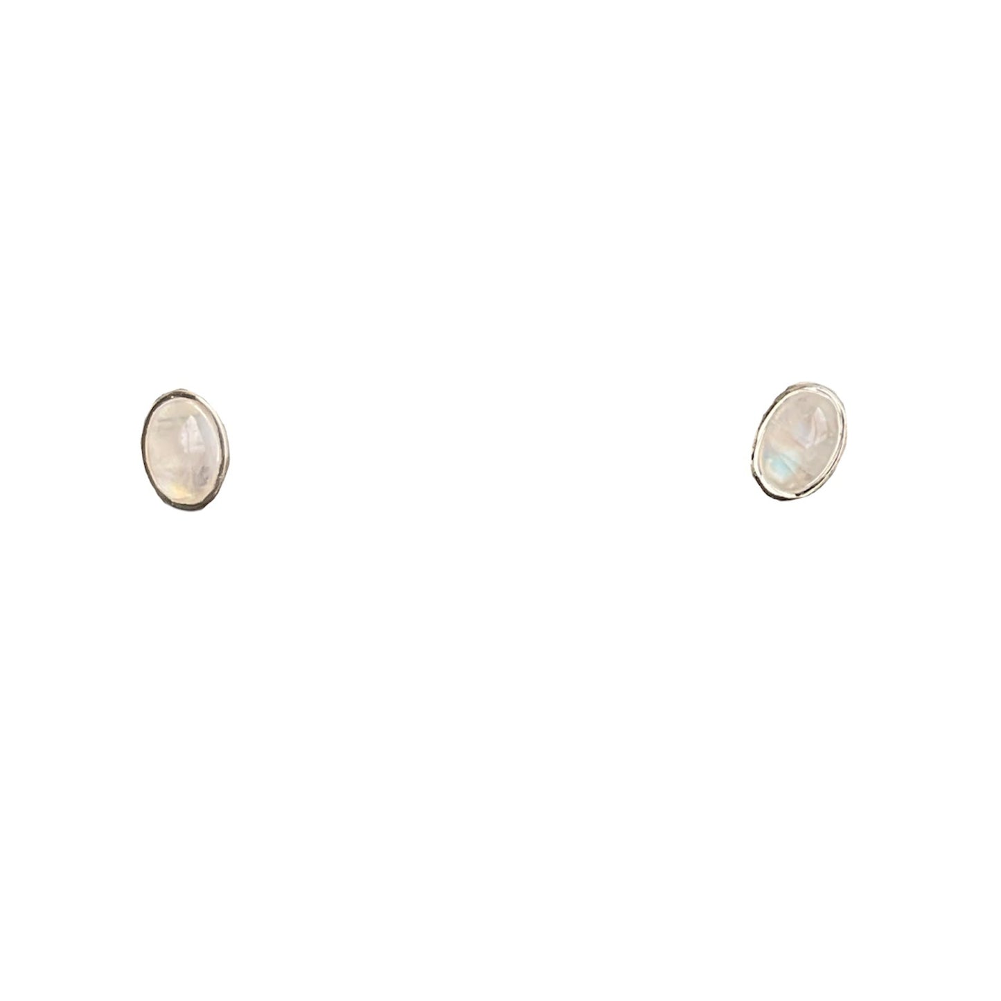 Smooth 5 x 7mm oval moonstone gemstones bezel set in sterling silver on posts and nuts.