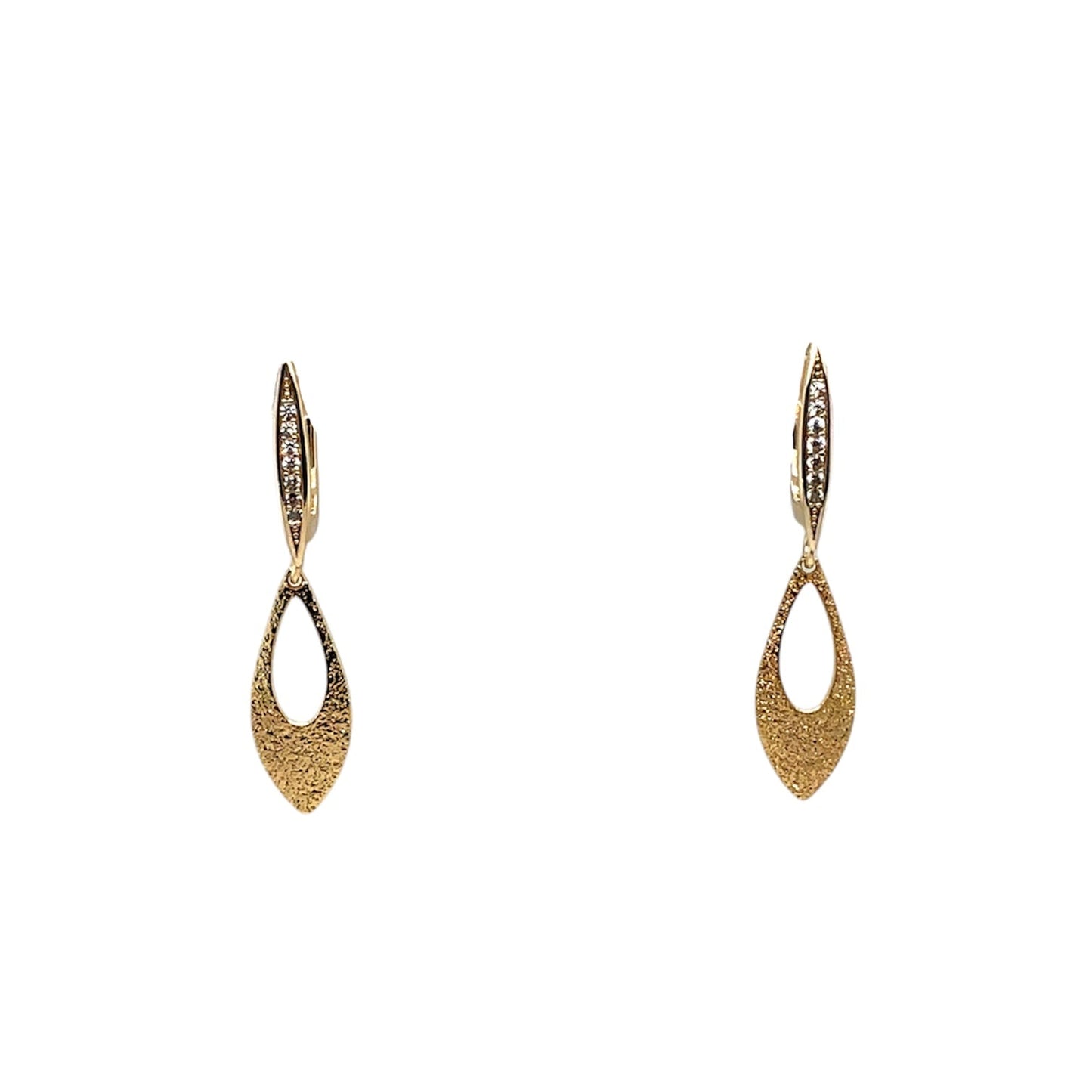 Cubic zirconia huggie hoop earring with a matte gold seed pod drop. These earrings are 14k gold over brass with surgical steel ear posts.