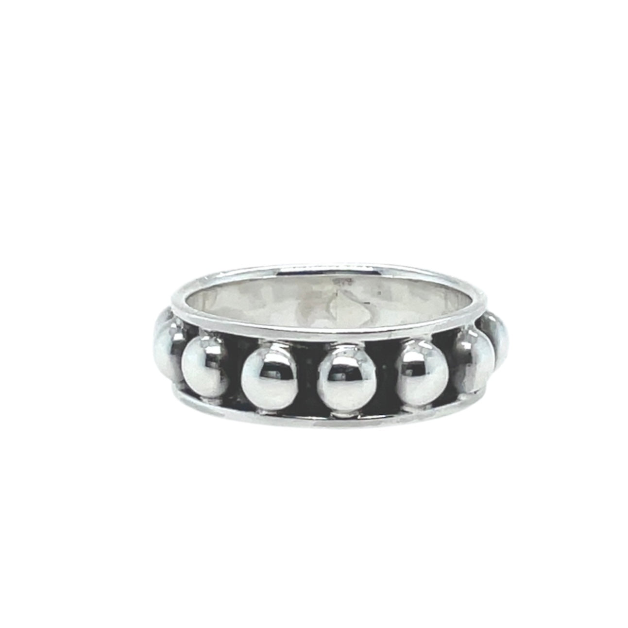 Smooth and shiny bubble band with high polished sterling silver with oxidized recesses for popping contrast.