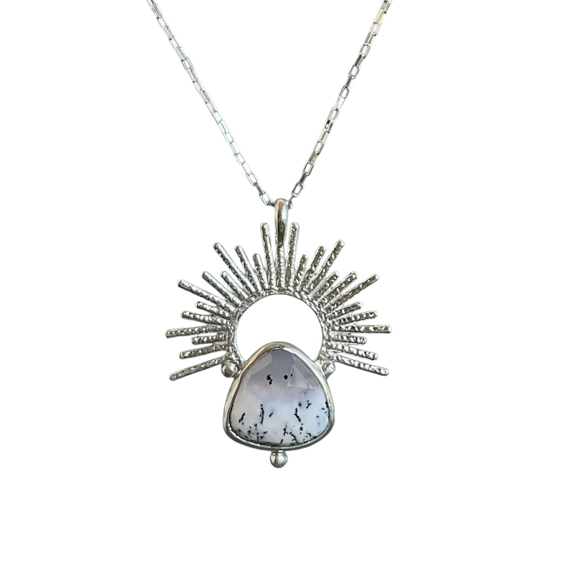 Snowy scenic dendritic opal gemstone set with a sterling silver sunrise halo