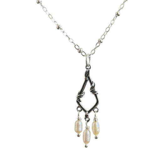 Sterling silver window frame with 3 fresh water pearl drops wire wrapped underneath on a sterling silver satellite chain. 