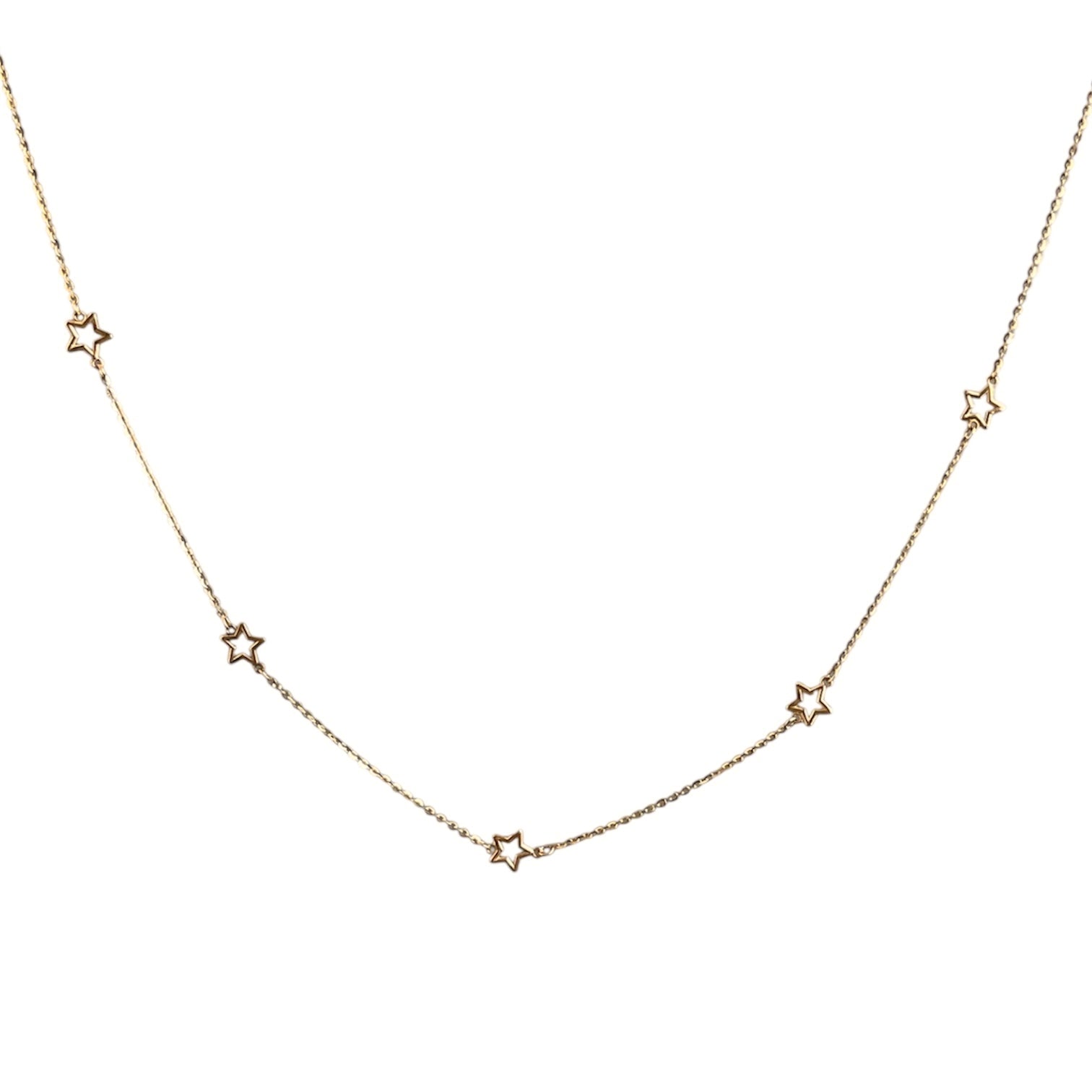 Gold necklace with star-shaped pendants on a white background