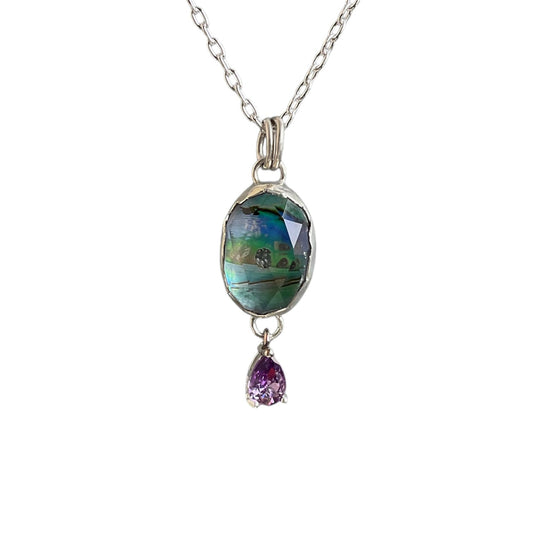 Sparkly abalone and quartz doublet with a faceted amethyst teardrop stone hanging underneath. Solid sterling silver setting and chain.
