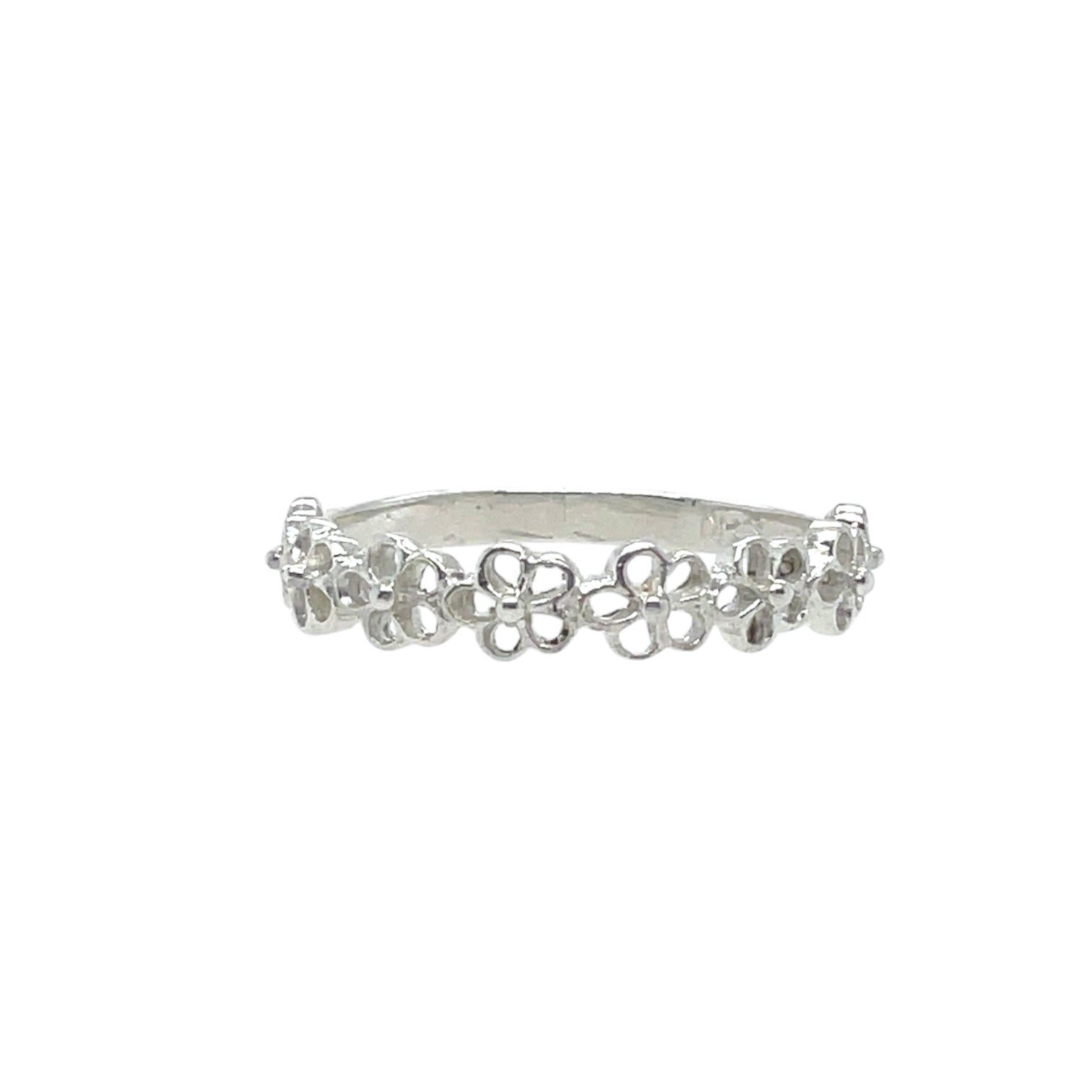 Dancing forget-me-not flowers on a half round ring band.  Sterling silver.