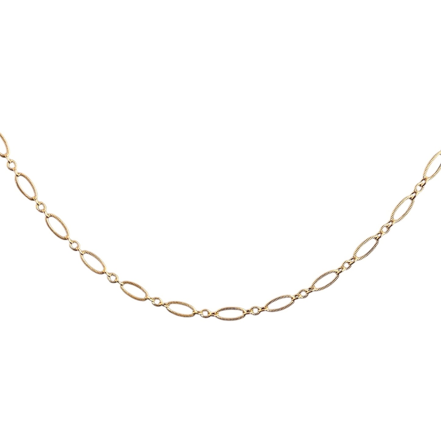 Gold chain necklace on a white background