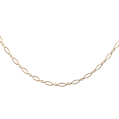 Gold chain necklace on a white background