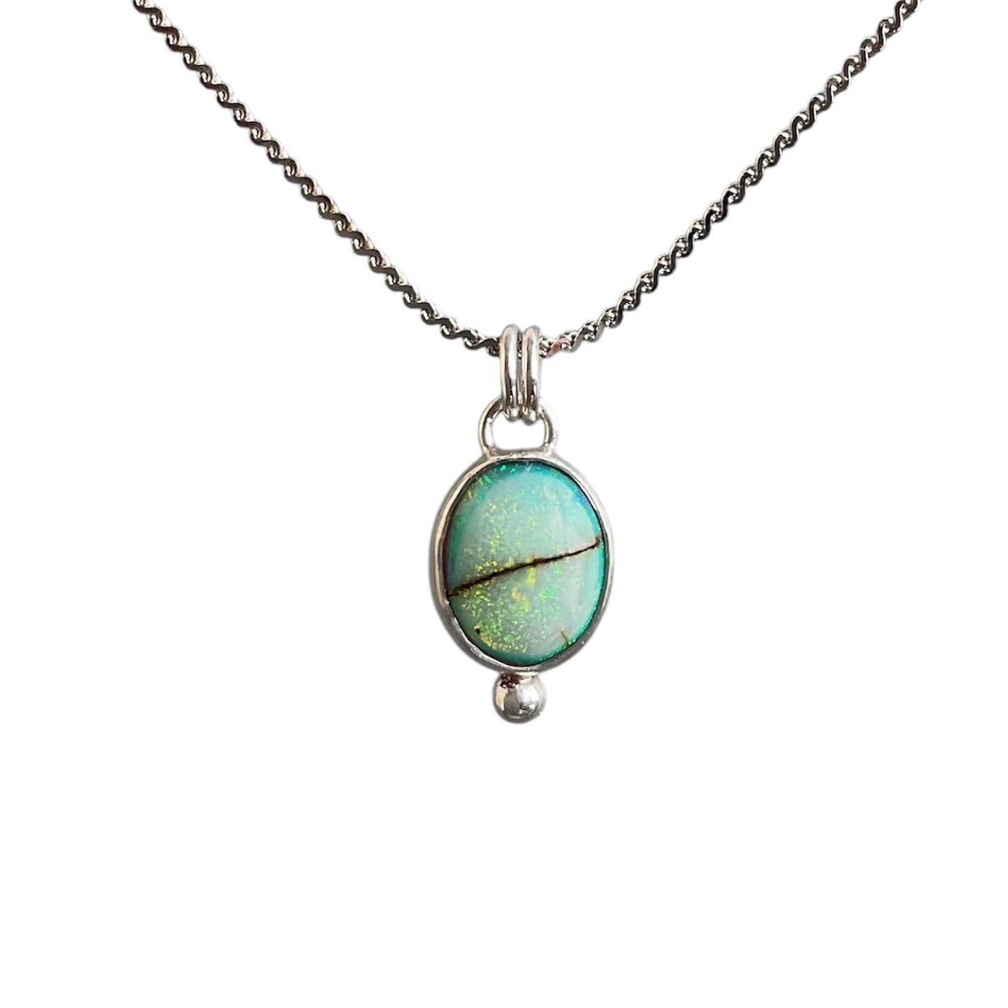 Blue and freen opal gemstone bezel set in sterling silver with a bead embellishment. Solid sterling silver setting and chain.