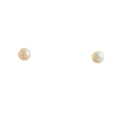 Smooth freshwater button pearls on sterling silver posts and nuts.
