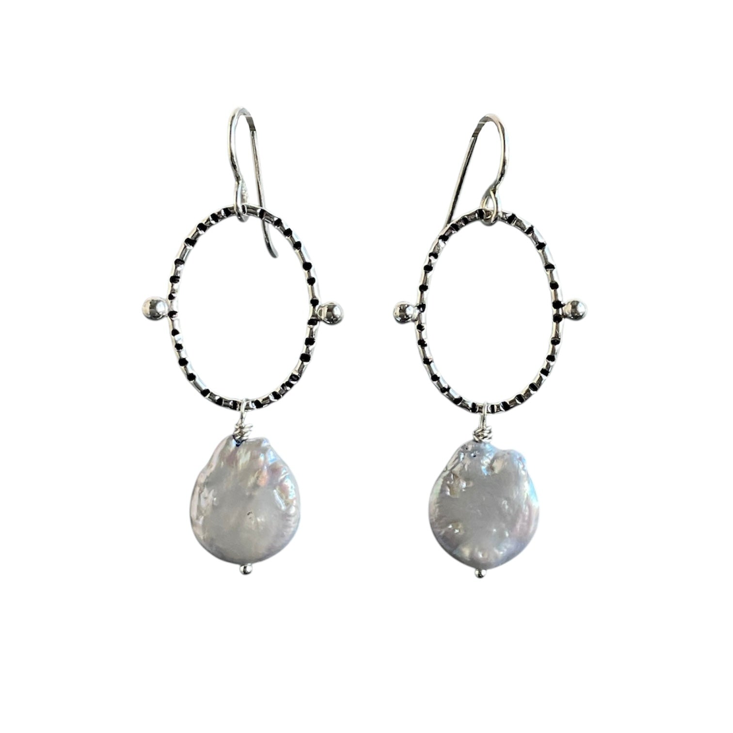  Fresh water pearl coins hanging from sterling silver oval components on sterling silver ear wires