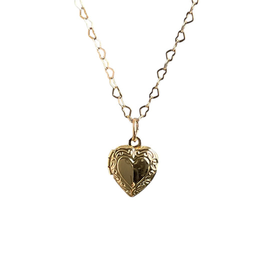 Small gold patterned heart locket on a cute heart shaped 14k gold-filled chain.